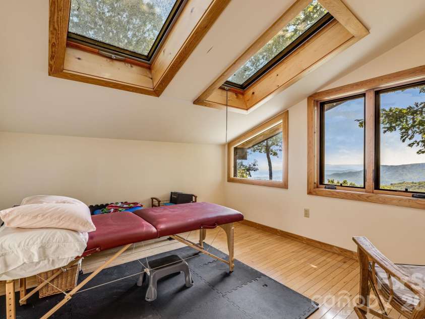 765/764 Osborne Knob Road, Little Switzerland, NC 28752.  MLS# CAR4303194, YatesRealty ID 200. Primary bedroom office/home gym