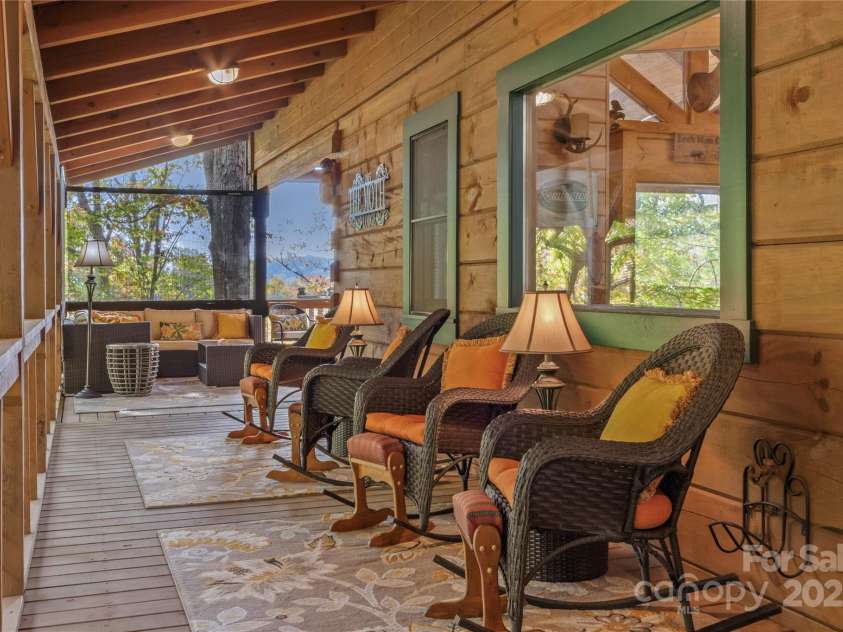 351 Buck Springs Run, Mars Hill, NC 28754.  MLS# CAR4320450, YatesRealty ID 2000. Inviting, Relaxing wrap around covered porch 