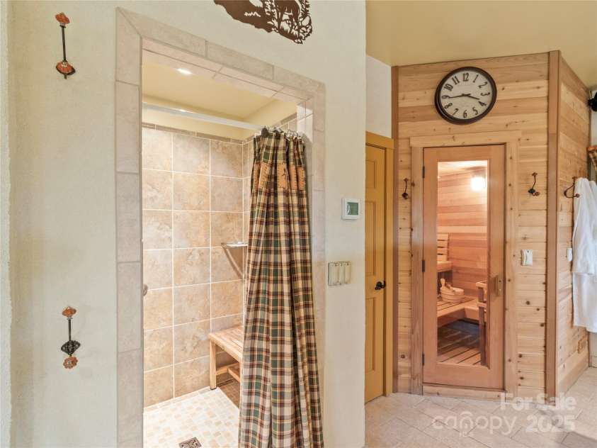 351 Buck Springs Run, Mars Hill, NC 28754.  MLS# CAR4320450, YatesRealty ID 2000. Shower Pool house with Sauna 