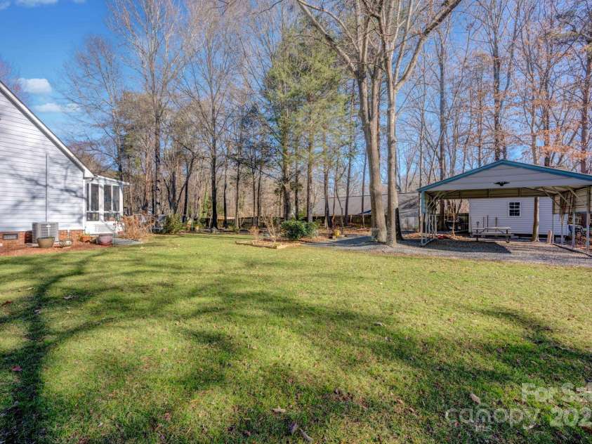 161 Picwyck Drive, Mooresville, NC 28115.  MLS# CAR4211316, YatesRealty ID 20000. 2-Car Carport and Outbuilding (both have power)