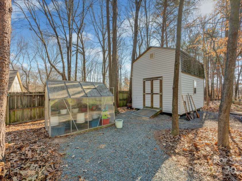 161 Picwyck Drive, Mooresville, NC 28115.  MLS# CAR4211316, YatesRealty ID 20000. Greenhouse & Outbuilding with Storage Loft