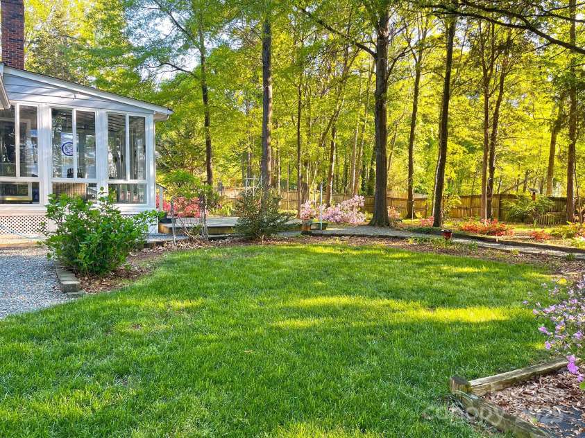 161 Picwyck Drive, Mooresville, NC 28115.  MLS# CAR4211316, YatesRealty ID 20000. Sunroom & Lawn
