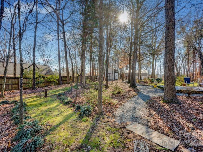 161 Picwyck Drive, Mooresville, NC 28115.  MLS# CAR4211316, YatesRealty ID 20000. Wooded Back Yard