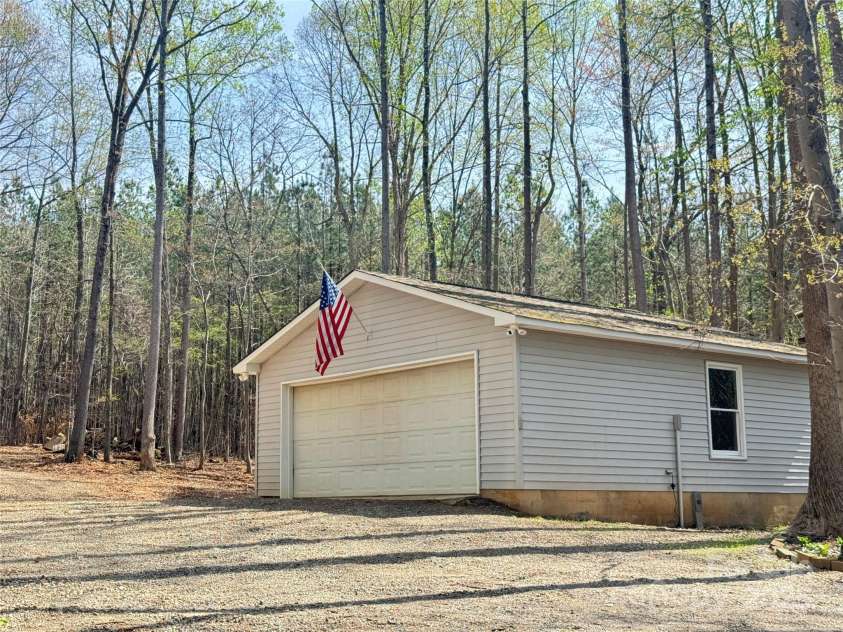 245 Clontz Hill Road, Troutman, NC 28166.  MLS# CAR4241890, YatesRealty ID 20003. 2 car garage with automatic door , water and power.