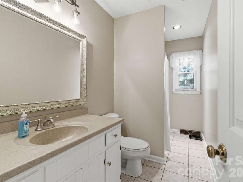 1210 Plum Branch Lane, Fort Mill, SC 29715.  MLS# CAR4304516, YatesRealty ID 20009. Spare bath on main floor