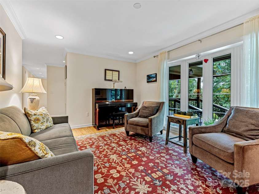 80 South Hill Drive, Brevard, NC 28712.  MLS# CAR4267667, YatesRealty ID 20009. Crown moldings and large windows