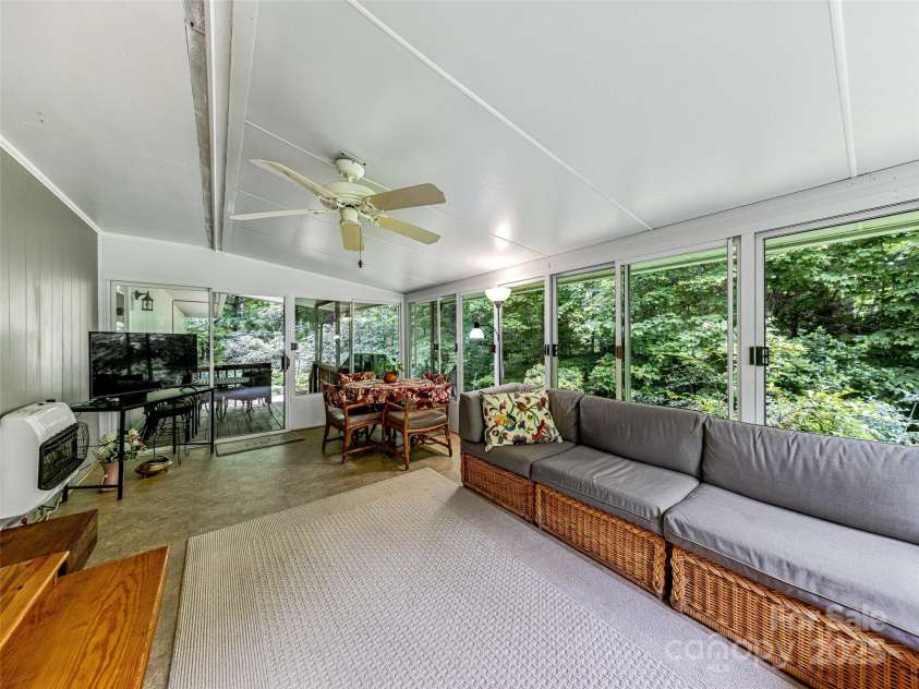 80 South Hill Drive, Brevard, NC 28712.  MLS# CAR4267667, YatesRealty ID 20009. Opens to covered deck