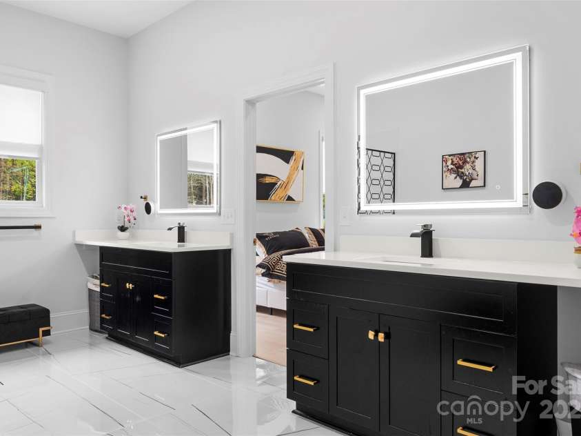 1045 Churchfield Lane, Rockwell, NC 28138.  MLS# CAR4310058, YatesRealty ID 2001. Large vanities tons of storage