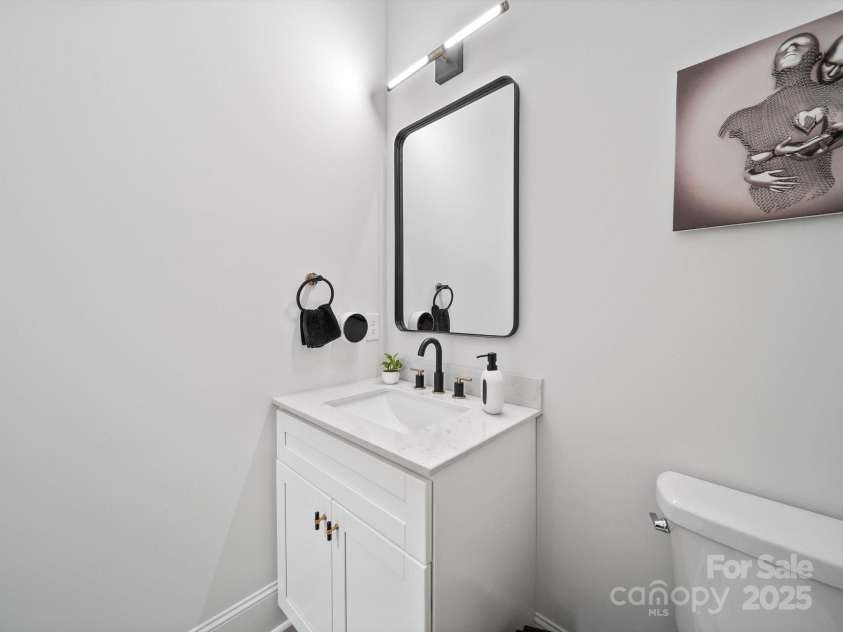 1045 Churchfield Lane, Rockwell, NC 28138.  MLS# CAR4310058, YatesRealty ID 2001. Powder room 