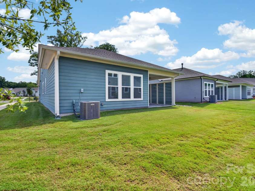 1002 Pastoral Place, Waxhaw, NC 28173.  MLS# CAR4400612, YatesRealty ID 20010. Rear Exterior