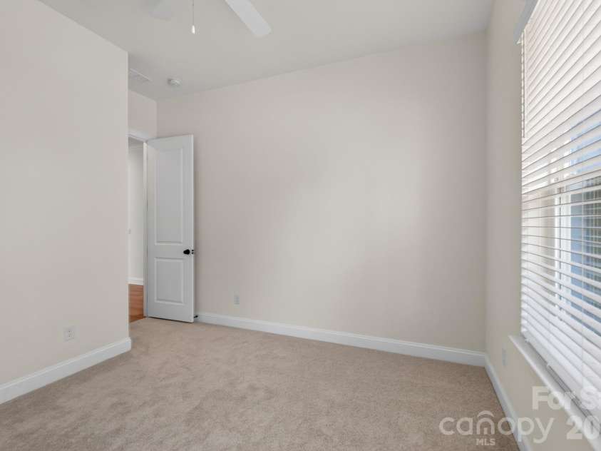 1002 Pastoral Place, Waxhaw, NC 28173.  MLS# CAR4400612, YatesRealty ID 20010. Secondary Bedroom