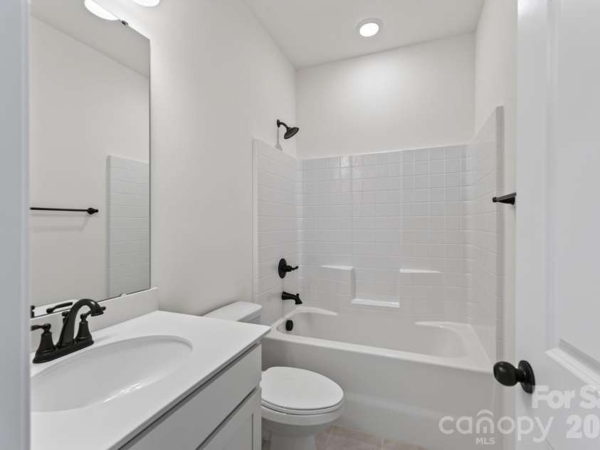 1002 Pastoral Place, Waxhaw, NC 28173.  MLS# CAR4400612, YatesRealty ID 20010. Upper Level Bathroom