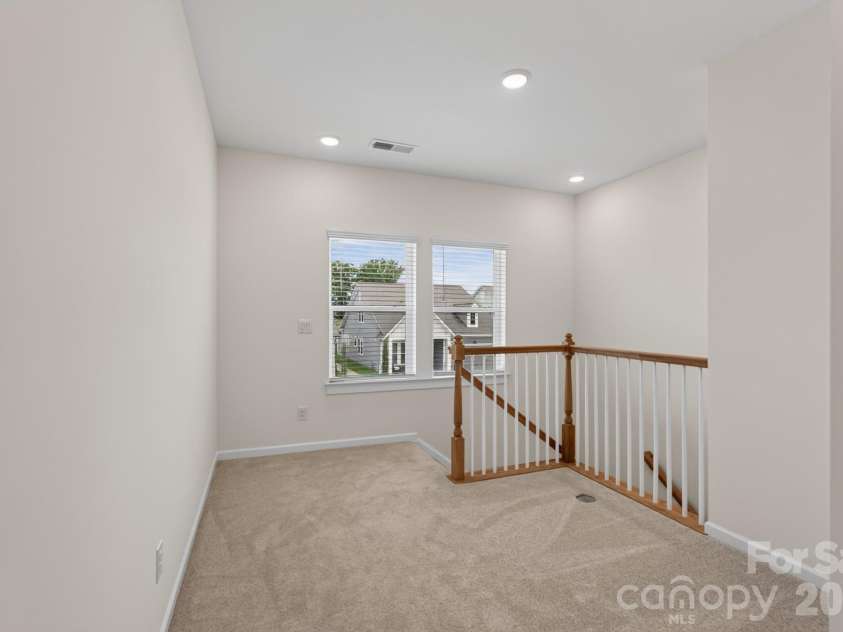 1002 Pastoral Place, Waxhaw, NC 28173.  MLS# CAR4400612, YatesRealty ID 20010. Upper Level Loft or Flex Space