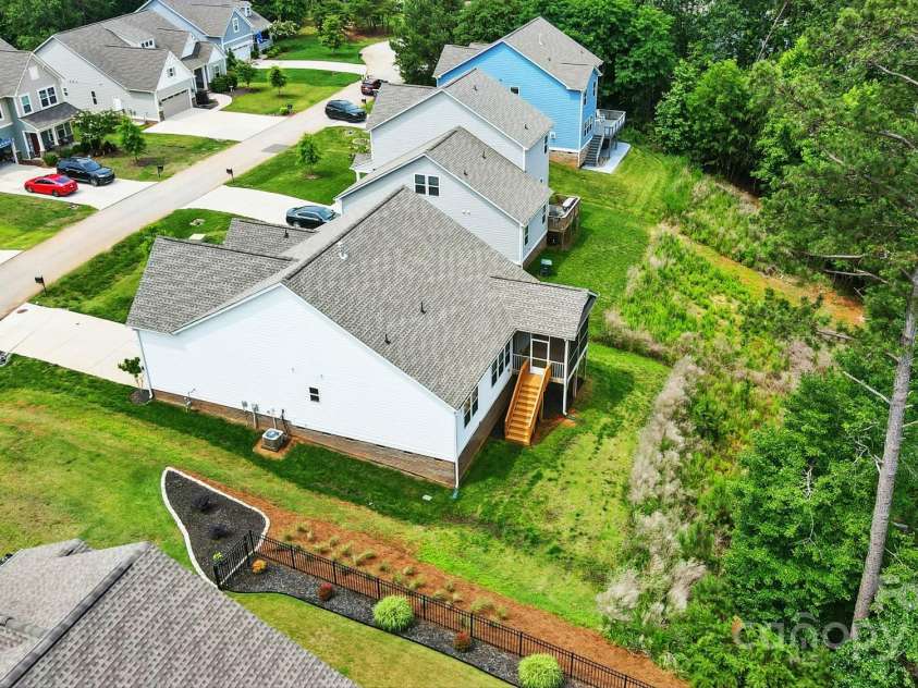 18619 Mainsail Court, Lancaster, SC 29720.  MLS# CAR4268719, YatesRealty ID 20012. Aerial Rear view of our subject ang neighboring properties along street