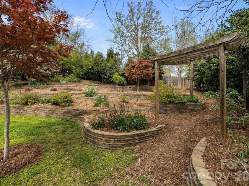 8108 Acacia Court, Waxhaw, NC 28173.  MLS# CAR4341327, YatesRealty ID 20018. Beautifully landscaped yard8108 Acacia CourtWaxhaw, NC 28173Providence Grove