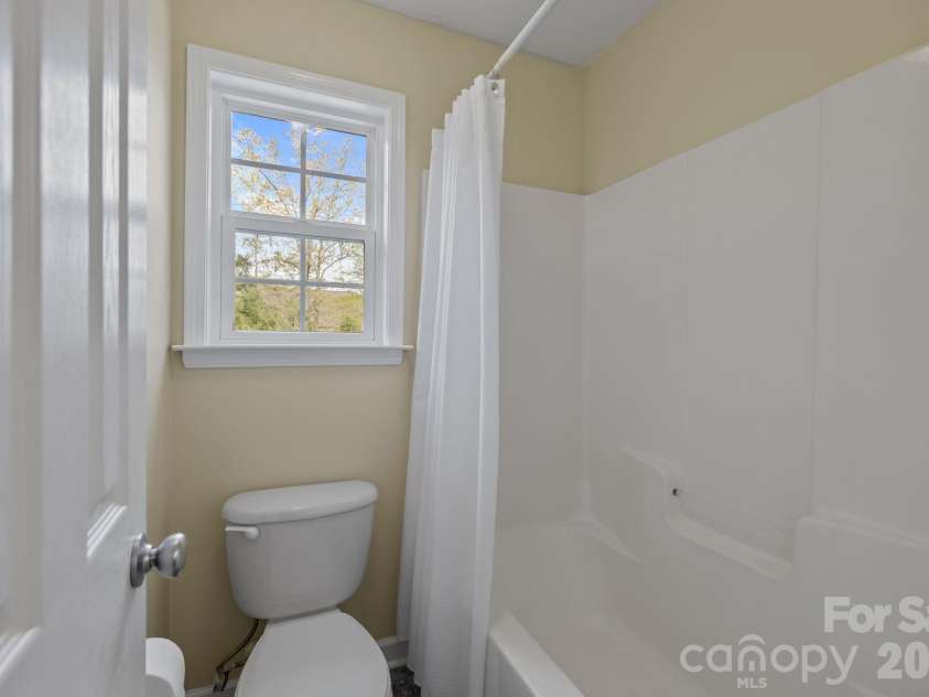 8108 Acacia Court, Waxhaw, NC 28173.  MLS# CAR4341327, YatesRealty ID 20018. Hall Bath with access from hall and two bedrooms8108 Acacia CourtWaxhaw, NC 28173Providence Grove