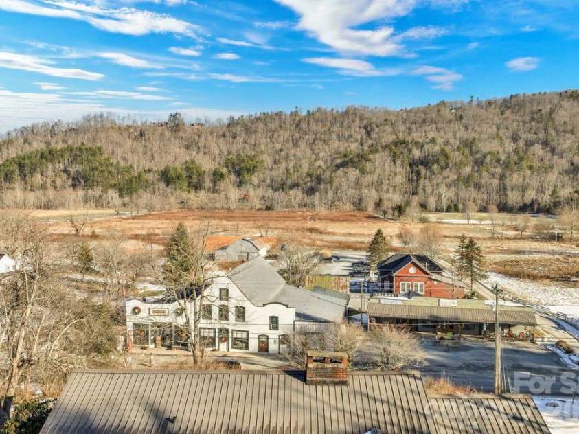 3606 NC Highway 194 None, Sugar Grove, NC 28679.  MLS# CAR4327655, YatesRealty ID 2002. Looking over roof of home - right at the Original Mast General Store!