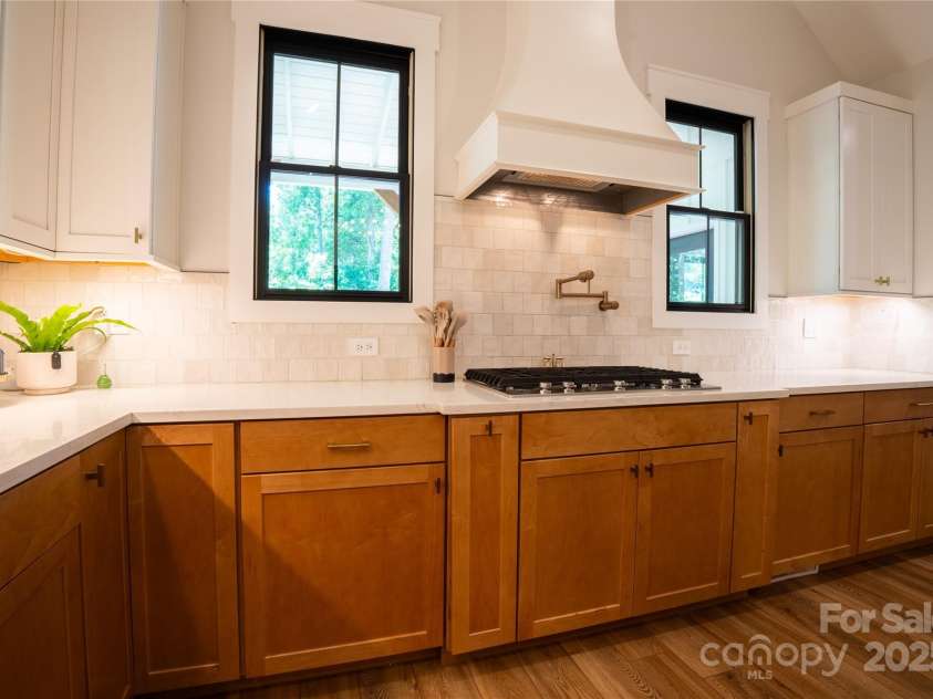 13 Cambridge Drive, Candler, NC 28715.  MLS# CAR4249606, YatesRealty ID 20021. 5-burner gas range with hood, potfiller