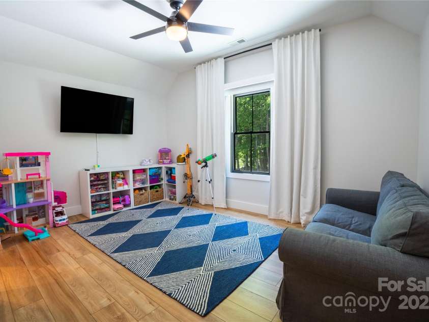 13 Cambridge Drive, Candler, NC 28715.  MLS# CAR4249606, YatesRealty ID 20021. Bedroom 3 on upper level