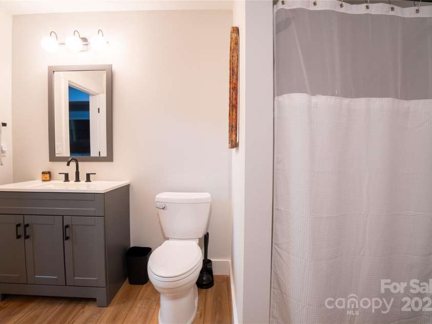 13 Cambridge Drive, Candler, NC 28715.  MLS# CAR4249606, YatesRealty ID 20021. Full bathroom in basement