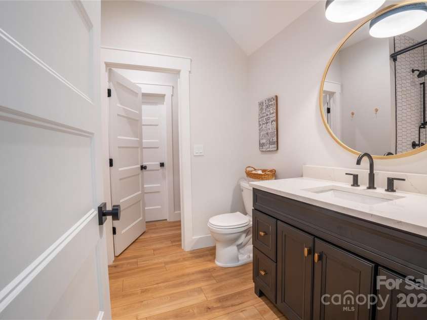 13 Cambridge Drive, Candler, NC 28715.  MLS# CAR4249606, YatesRealty ID 20021. Jack and Jill bathroom on upper level