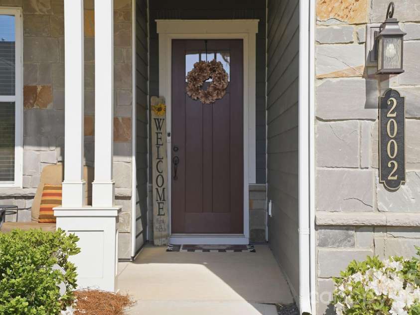 2002 Belle Mont Farm Avenue, Monroe, NC 28110.  MLS# CAR4366428, YatesRealty ID 20023. Front entry