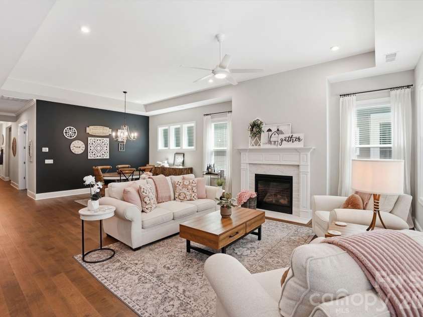 2002 Belle Mont Farm Avenue, Monroe, NC 28110.  MLS# CAR4366428, YatesRealty ID 20023. Great room and dining area