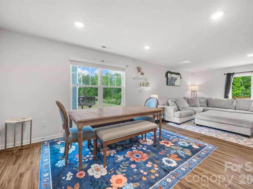 2742 Oldfield Drive, Monroe, NC 28110.  MLS# CAR4365069, YatesRealty ID 20025. Dining area is open to kitchen and living room