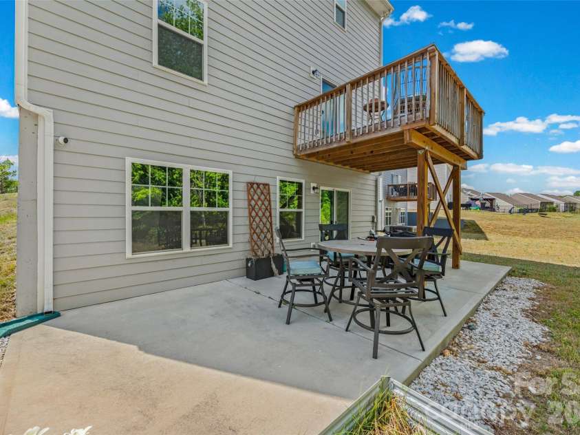 2742 Oldfield Drive, Monroe, NC 28110.  MLS# CAR4365069, YatesRealty ID 20025. Full concrete patio off the walk-out basement