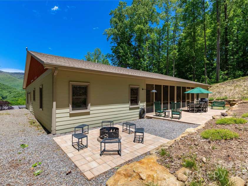 33 Freedom Drive, Waynesville, NC 28786.  MLS# CAR4260986, YatesRealty ID 20025. Private Back Yard Firepit and Outdoor Patio