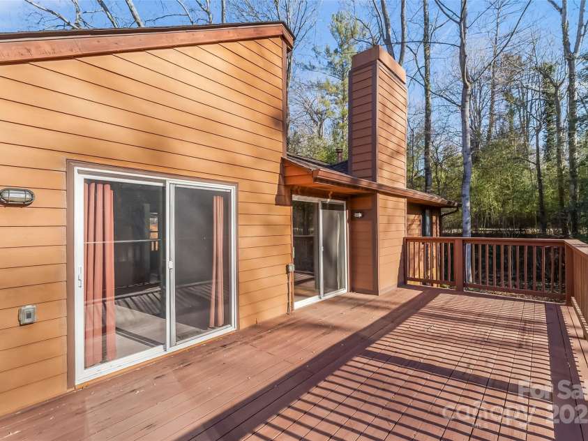 39 Oak Court, Fletcher, NC 28732.  MLS# CAR4330927, YatesRealty ID 20027. Large deck offers tremendous space!