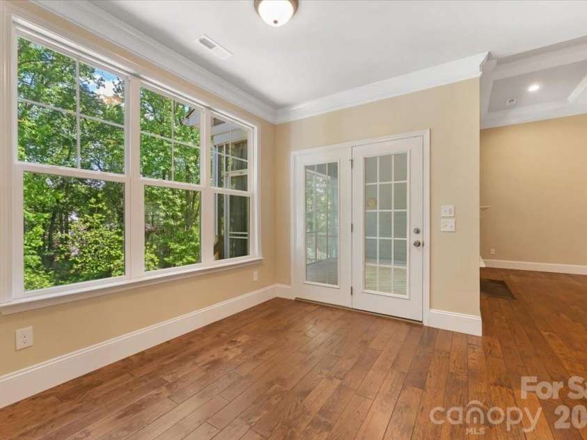 7304 Sedgebrook Drive, Stanley, NC 28164.  MLS# CAR4372754, YatesRealty ID 20028. French doors in the breakfast room blur the line between inside and out — open them up and your morning routine suddenly has a whole lot more fresh air.