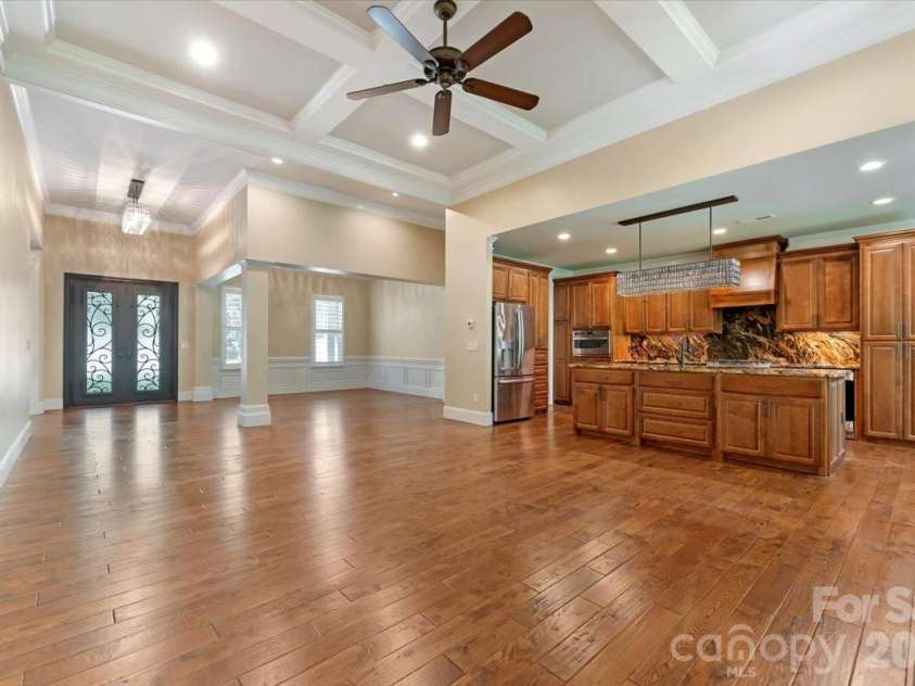 7304 Sedgebrook Drive, Stanley, NC 28164.  MLS# CAR4372754, YatesRealty ID 20028. From one vantage point you can see it all — dining room, kitchen, living room — open, connected, and ready for every gathering from casual Tuesday nights to holiday celebrations.