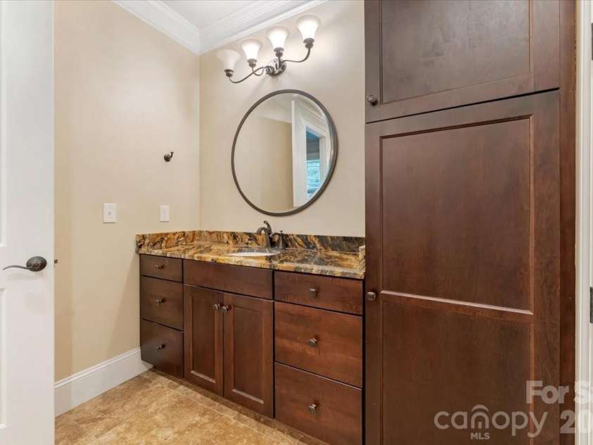 7304 Sedgebrook Drive, Stanley, NC 28164.  MLS# CAR4372754, YatesRealty ID 20028. Separate sink areas, generous cabinet storage, and zero compromises — the primary bath works as hard as it looks good.