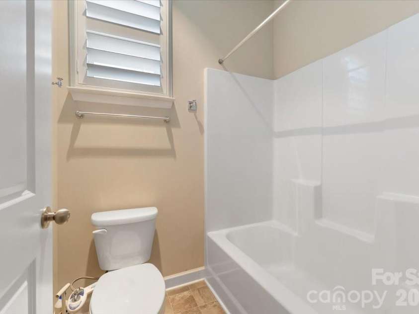 7304 Sedgebrook Drive, Stanley, NC 28164.  MLS# CAR4372754, YatesRealty ID 20028. Shared bath. Private space. The separate shower, tub combo and toilet make all the difference.
