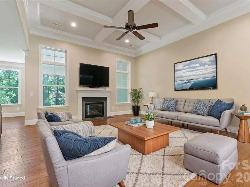 7304 Sedgebrook Drive, Stanley, NC 28164.  MLS# CAR4372754, YatesRealty ID 20028. Virtually staged. Endlessly versatile. This living room was built to impress long before the furniture arrived.