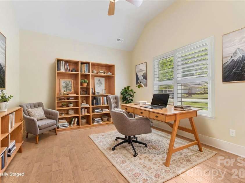 7304 Sedgebrook Drive, Stanley, NC 28164.  MLS# CAR4372754, YatesRealty ID 20028. Virtually staged to spark the imagination — the office flex room's vaulted ceiling, plantation shutters, and engineered hardwoods create a space that works as hard and looks as good as any room in the home.