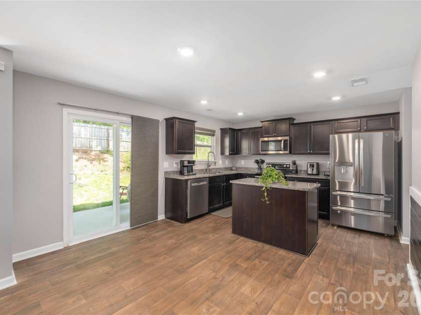 220 Roper Street, Candler, NC 28715.  MLS# CAR4372935, YatesRealty ID 20031. 