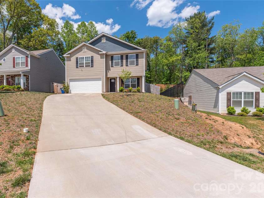 220 Roper Street, Candler, NC 28715.  MLS# CAR4372935, YatesRealty ID 20031. Front view with plenty of parking 