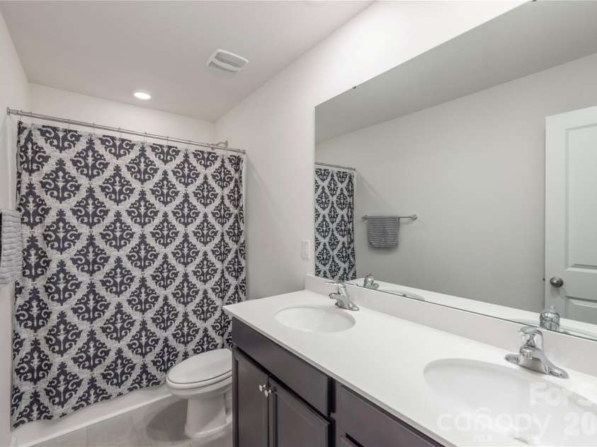 220 Roper Street, Candler, NC 28715.  MLS# CAR4372935, YatesRealty ID 20031. Full bath on 2nd floor