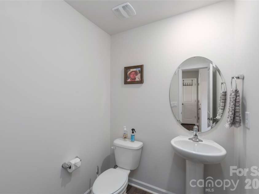 220 Roper Street, Candler, NC 28715.  MLS# CAR4372935, YatesRealty ID 20031. Half bath on main floor