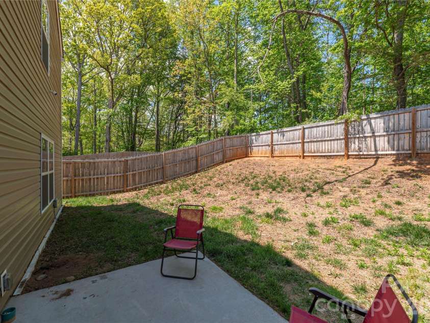 220 Roper Street, Candler, NC 28715.  MLS# CAR4372935, YatesRealty ID 20031. Private fenced in back yard