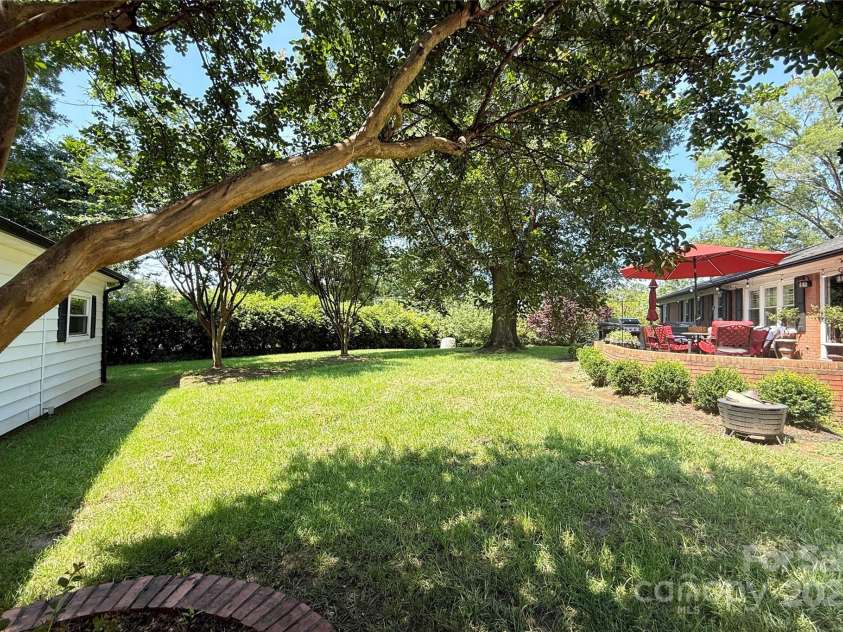 441 Crestside Drive, Concord, NC 28025.  MLS# CAR4269264, YatesRealty ID 20034. Backyard