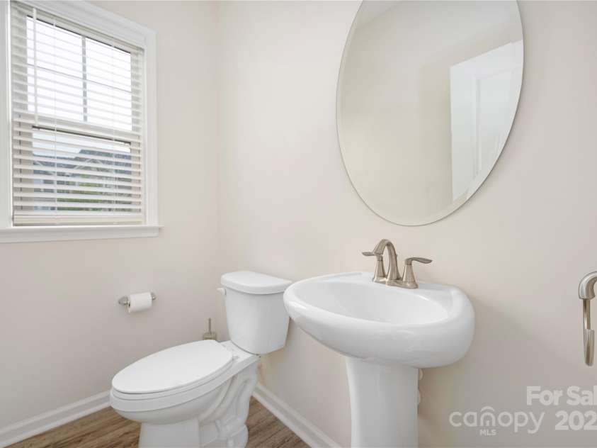 23112 Clarabelle Drive, Charlotte, NC 28273.  MLS# CAR4244219, YatesRealty ID 20035. Half bath on main floor