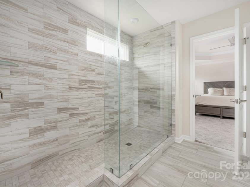 23112 Clarabelle Drive, Charlotte, NC 28273.  MLS# CAR4244219, YatesRealty ID 20035. Primary shower