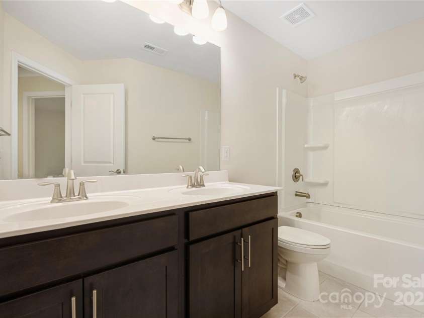 23112 Clarabelle Drive, Charlotte, NC 28273.  MLS# CAR4244219, YatesRealty ID 20035. Second full bathroom