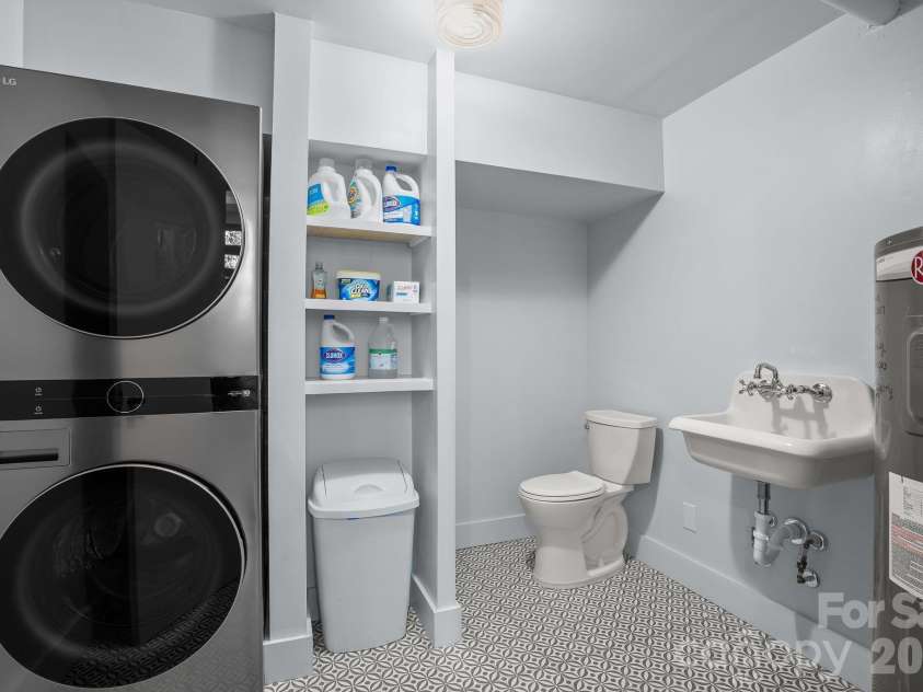 75 High Valley Estates Drive, Alexander, NC 28701.  MLS# CAR4372479, YatesRealty ID 20036. Basement half bath and laundry room
