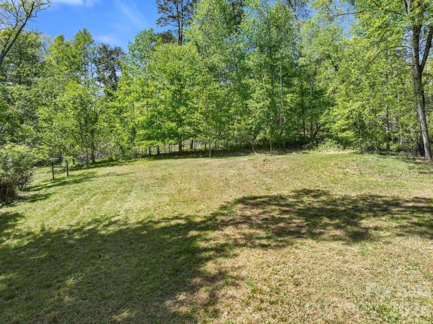 75 High Valley Estates Drive, Alexander, NC 28701.  MLS# CAR4372479, YatesRealty ID 20036. Fantastic back yard