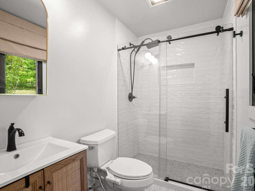 75 High Valley Estates Drive, Alexander, NC 28701.  MLS# CAR4372479, YatesRealty ID 20036. Fully renovated primary bathroom