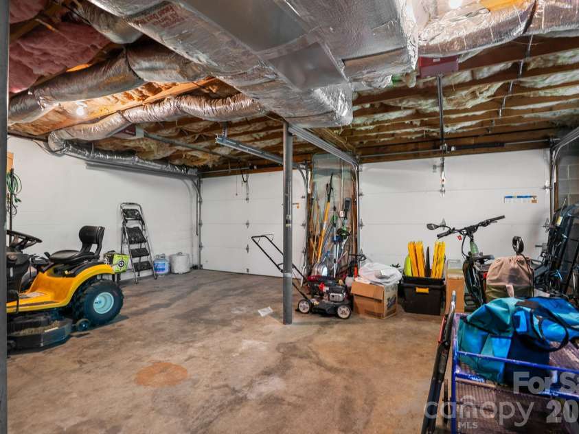 75 High Valley Estates Drive, Alexander, NC 28701.  MLS# CAR4372479, YatesRealty ID 20036. Oversized side entry double car drive under garage